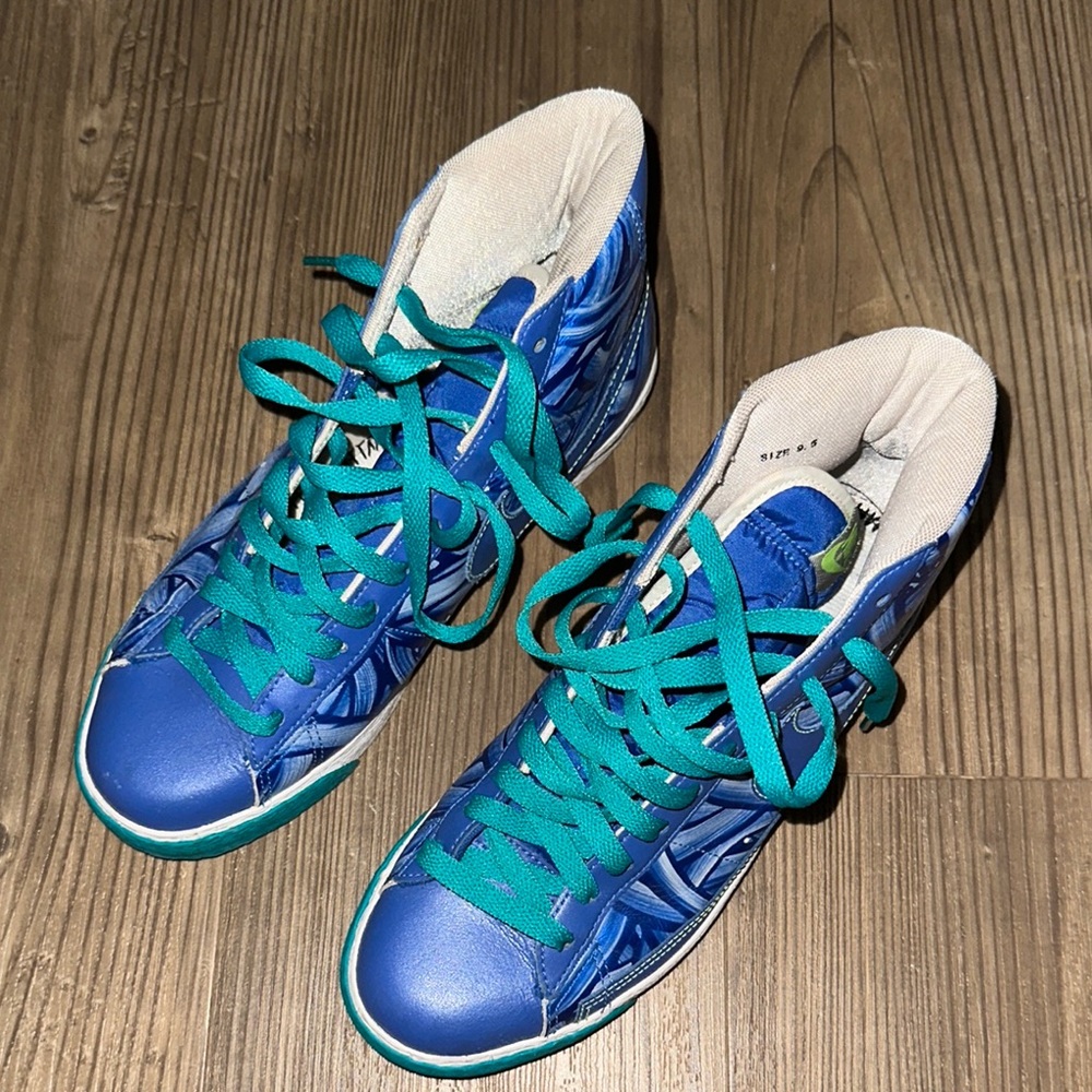 Blue High-Top Nike flights with Teal Laces
